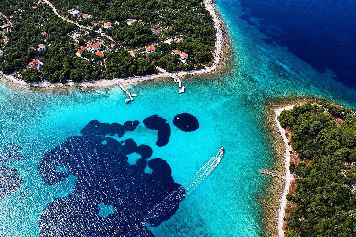 Aerial view of the Blue Lagoon turquoise waters at Krknjaši